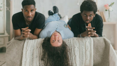 multicultural love relationships concept white woman lying bed with two dark skinned men indoor portrait interracial friends two male african guys relaxing with their girlfriend bed 149066 2171